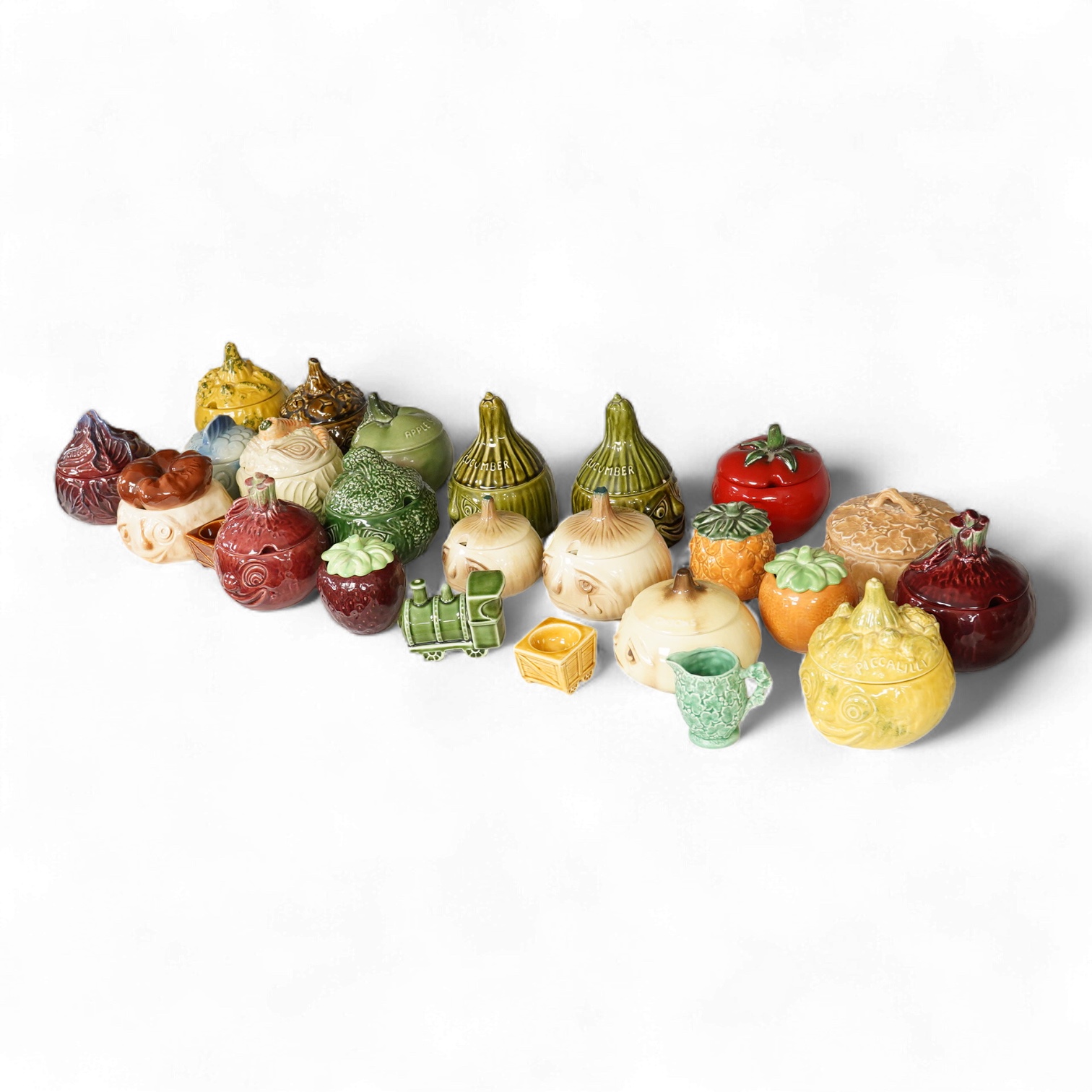 A collection of eighteen Sylvac vegetable pots and table accessories, largest 15cm high